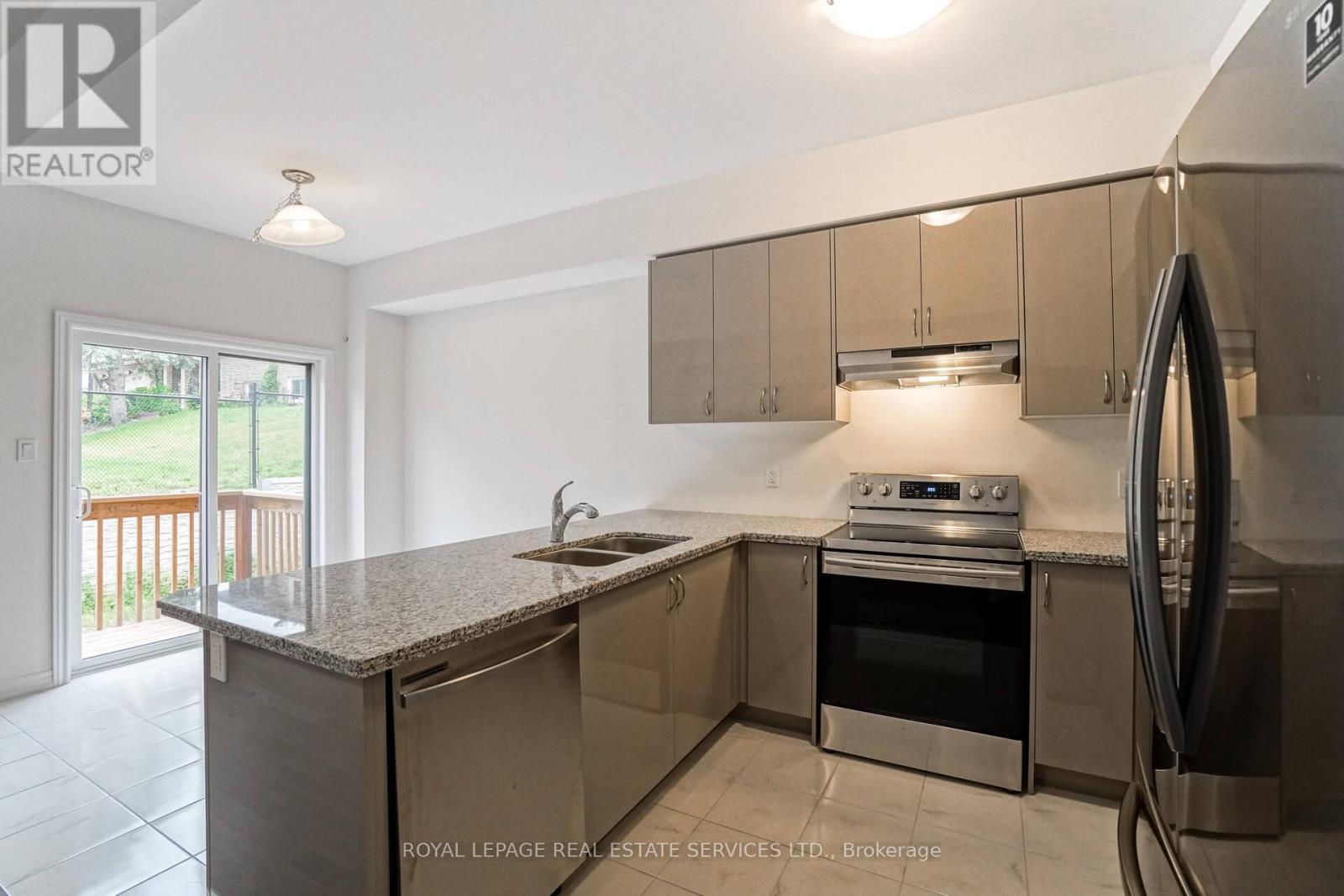 2 - 515 Garner Road W, Hamilton, ON - Indoor Photo Showing Kitchen With Double Sink