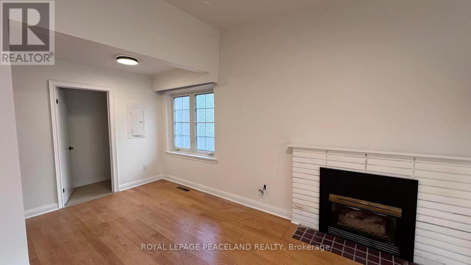 Upper - 66 Paperbirch Drive, Toronto, ON - Indoor Photo Showing Other Room With Fireplace