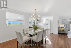 Dining Space Overlooking Kitchen and Florida Rooms -