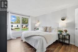 Well-lit Primary Bedroom -