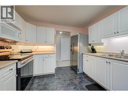 Bright Spacious Eat in Kitchen with newer Stainless Steel Appliances -