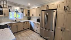 GOURMET KITCHEN WITH MODERN APPLIANCES -