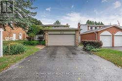 FRONT ELEVATION WITH DOUBLE PAVED DRIVE -