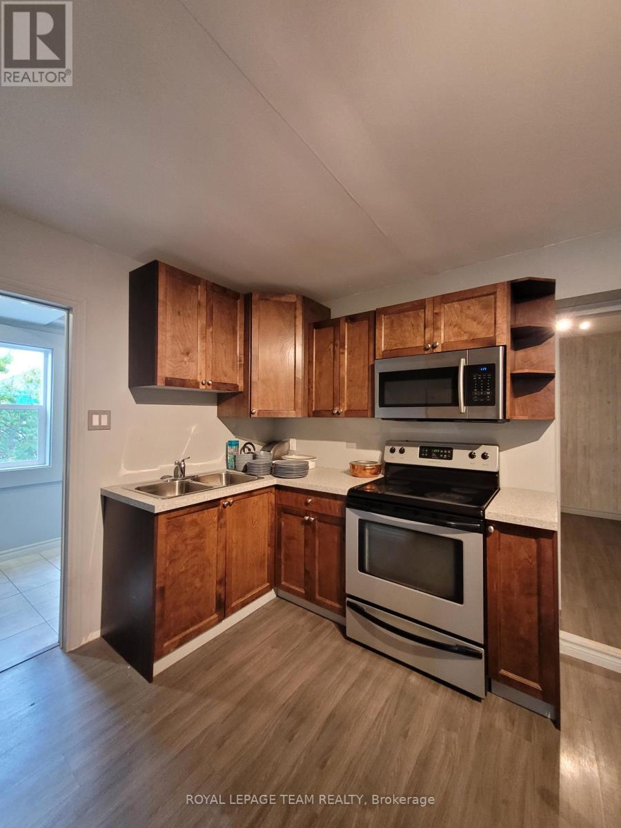 1008 St. Laurent Boulevard, Ottawa, ON - Indoor Photo Showing Kitchen With Double Sink