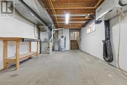 utility room walk out basement into 2 bay garage -