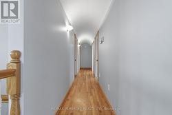 main floor hall way with custom arch ceiling -