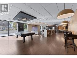 Main floor lounge - pool table and big screen -