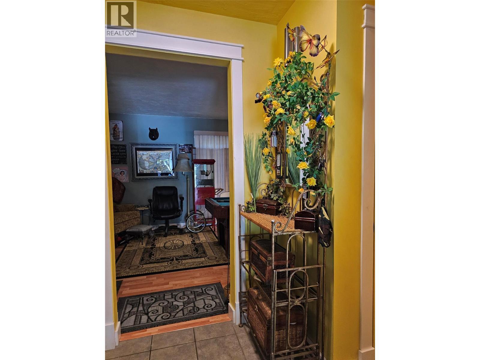 Entrance from Double Attached Garage to - 599 Clifton Road S, Kelowna, BC - Photo Showing Other Room