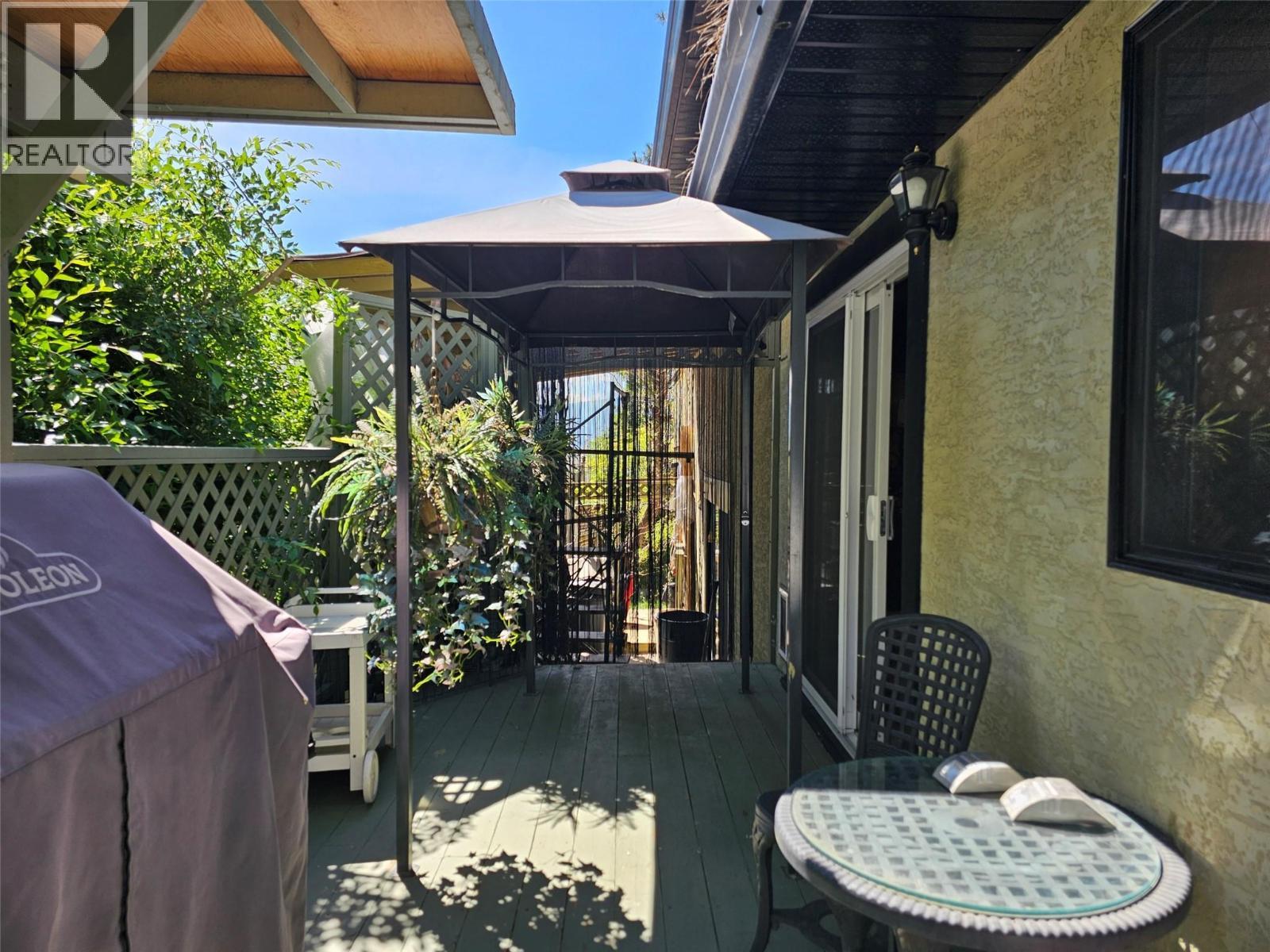 Private BBQ Deck - 599 Clifton Road S, Kelowna, BC - Outdoor With Deck Patio Veranda With Exterior