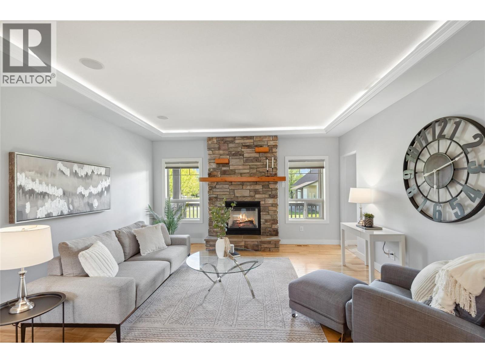 5575 Highway 6 Highway, Coldstream, BC - Indoor Photo Showing Living Room With Fireplace