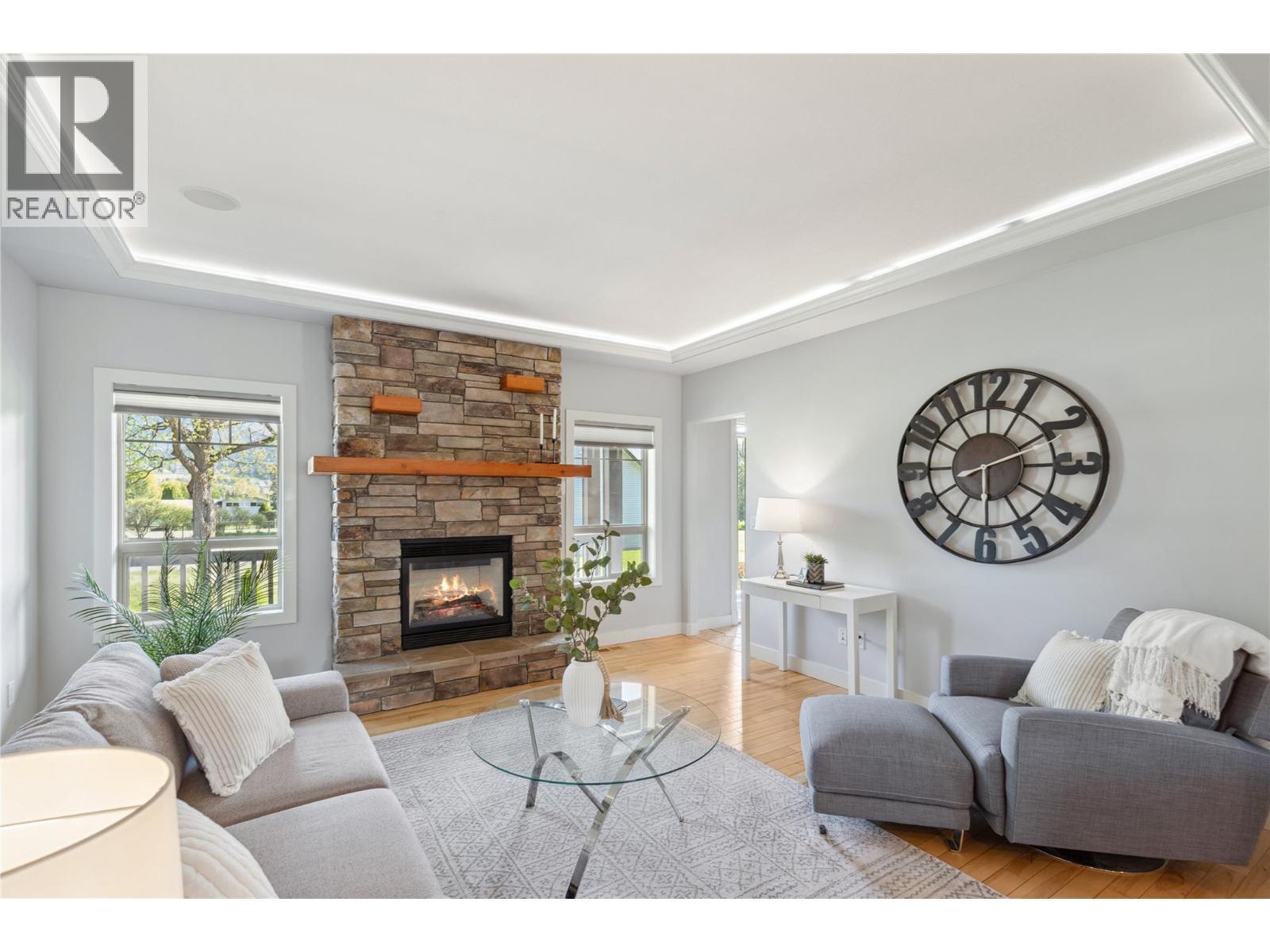 5575 Highway 6 Highway, Coldstream, BC - Indoor Photo Showing Living Room With Fireplace