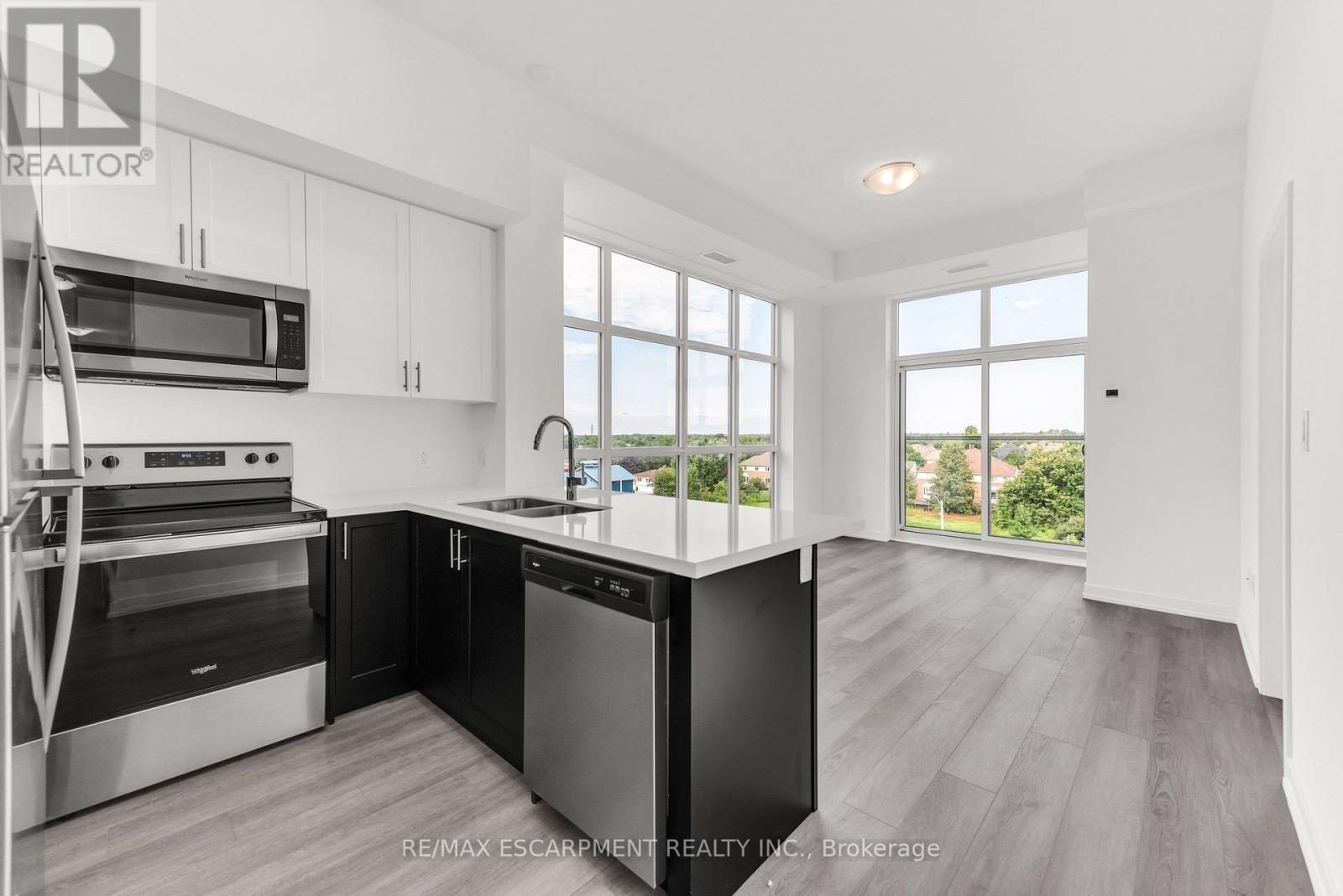 502 - 460 Dundas Street E, Hamilton, ON - Indoor Photo Showing Kitchen With Stainless Steel Kitchen With Double Sink With Upgraded Kitchen