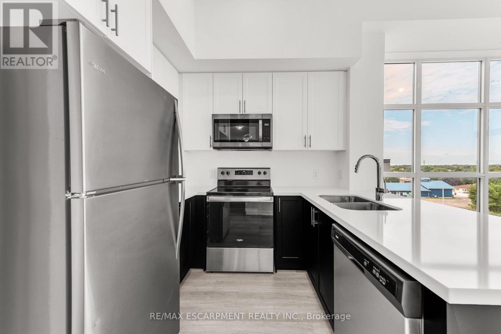 502 - 460 Dundas Street E, Hamilton, ON - Indoor Photo Showing Kitchen With Stainless Steel Kitchen With Double Sink With Upgraded Kitchen