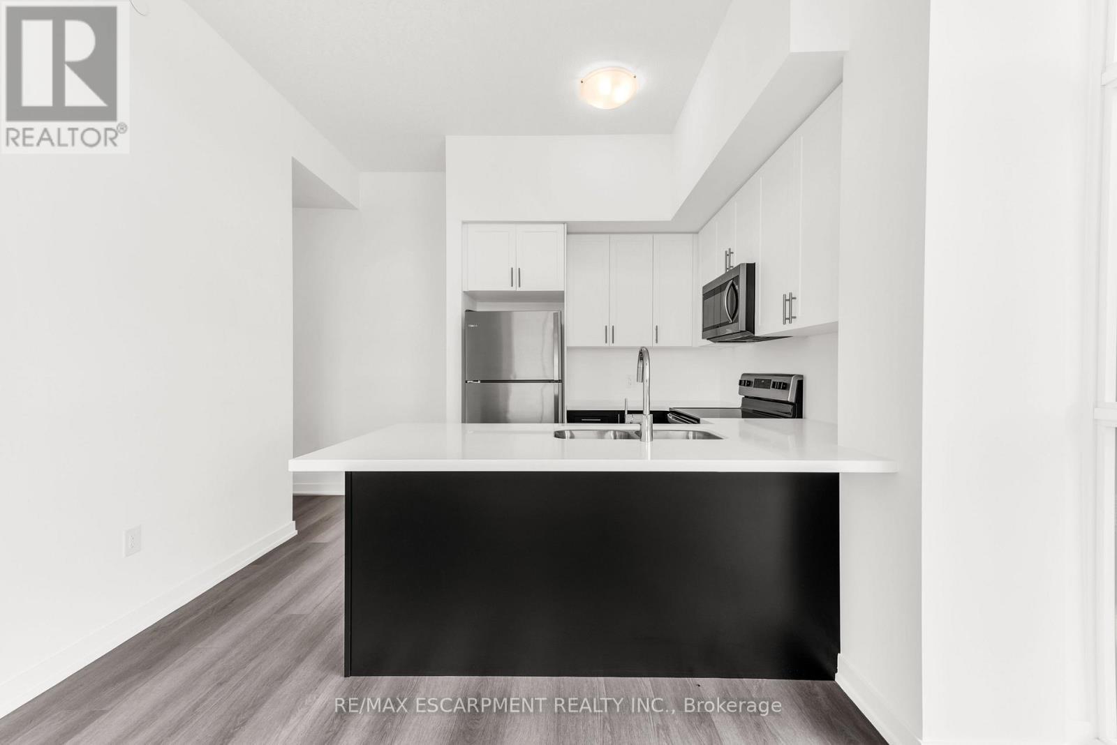 502 - 460 Dundas Street E, Hamilton, ON - Indoor Photo Showing Kitchen With Double Sink