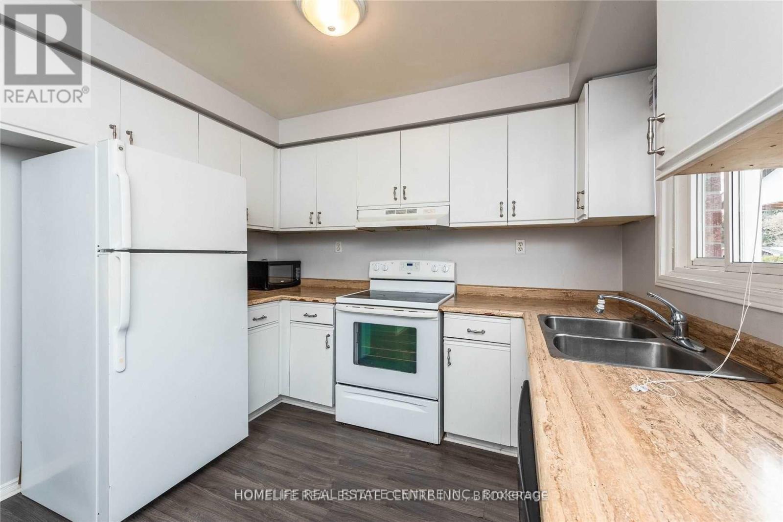 79 Hart Boulevard S, Clarington, ON - Indoor Photo Showing Kitchen With Double Sink