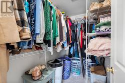 Primary Bedroom Walk In Closet -