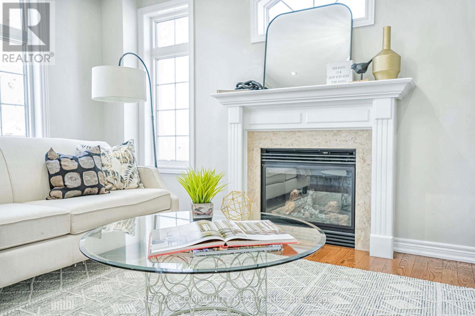 42 Reginald Lamb Crescent, Markham, ON - Indoor Photo Showing Living Room With Fireplace