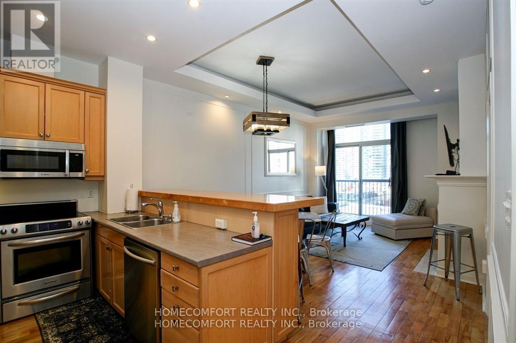 701 - 8 Wellesley Street E, Toronto, ON - Indoor Photo Showing Kitchen With Double Sink