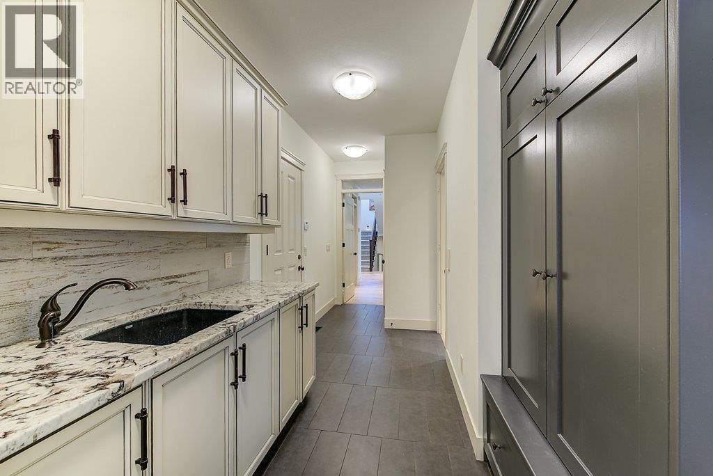 Laundry / Mud Room - 425 Audubon Court, Kelowna, BC - Indoor Photo Showing Kitchen