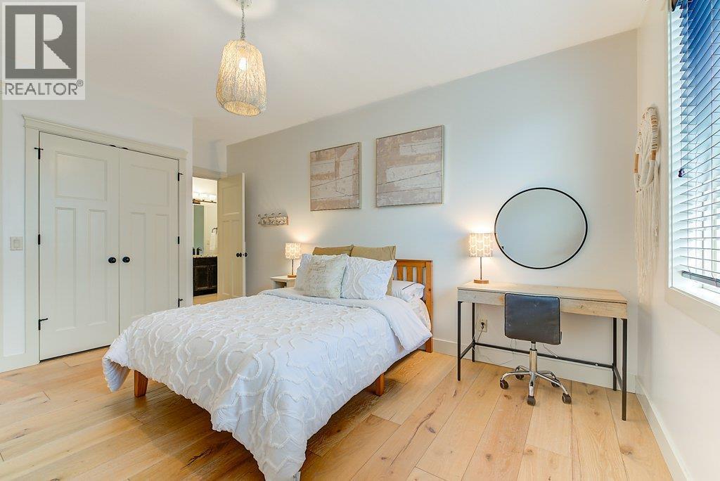 Upper level bedroom 1 - 425 Audubon Court, Kelowna, BC - Indoor Photo Showing Bedroom