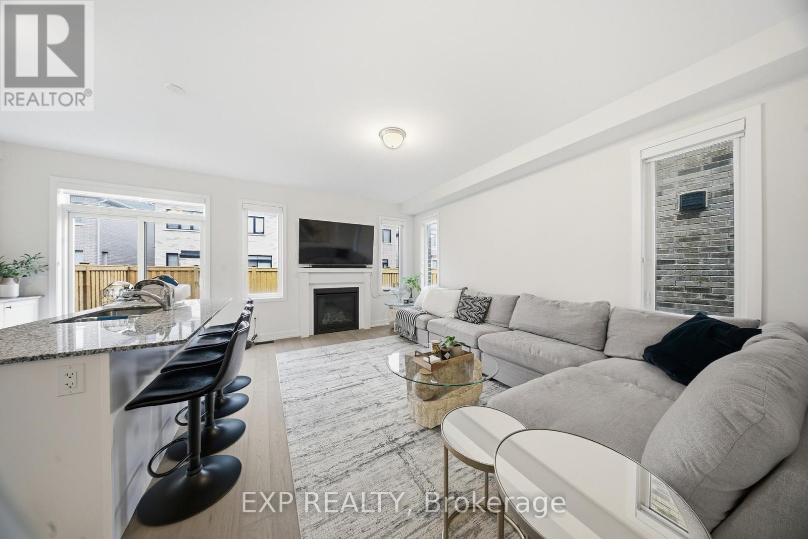 617 Etheridge Avenue, Milton, ON - Indoor Photo Showing Living Room With Fireplace