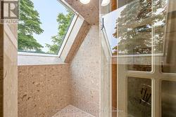 Primary ensuite shower with beach view -