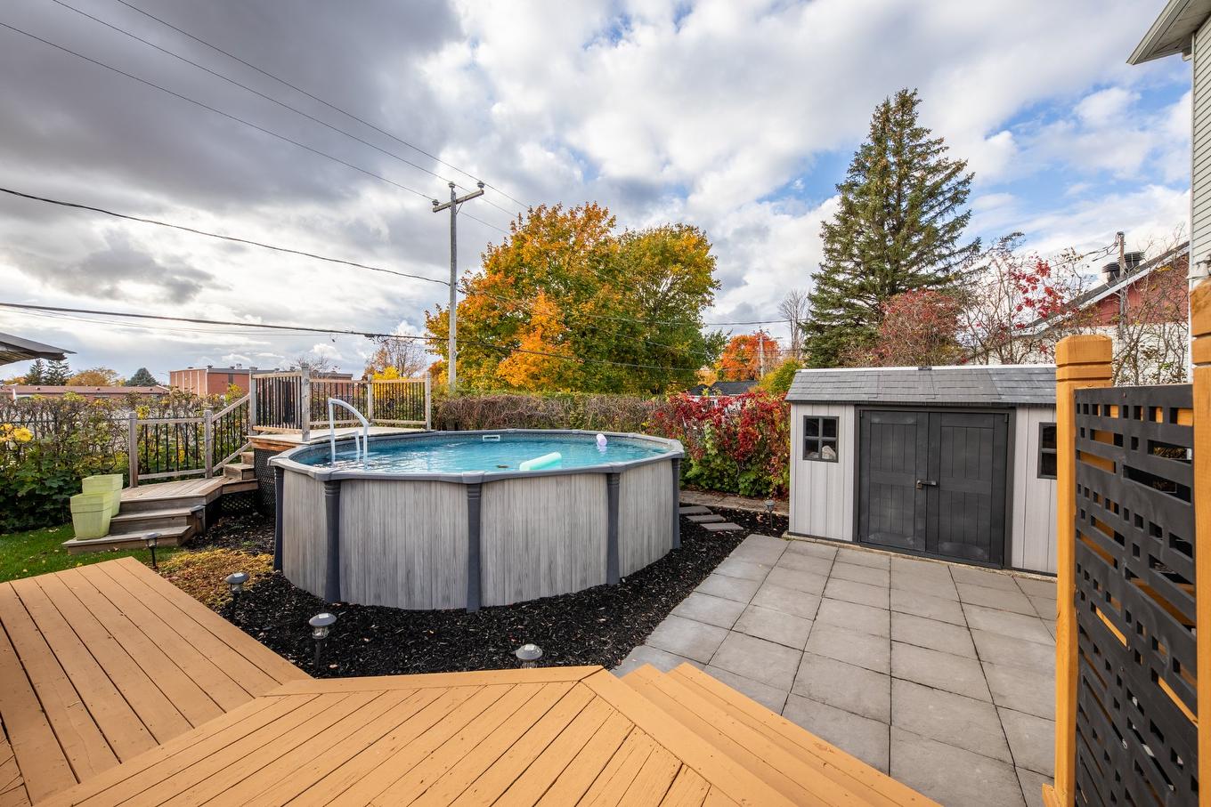 Pool - 418 Rue De Grenoble, Sainte-Julie, QC - Outdoor With Above Ground Pool