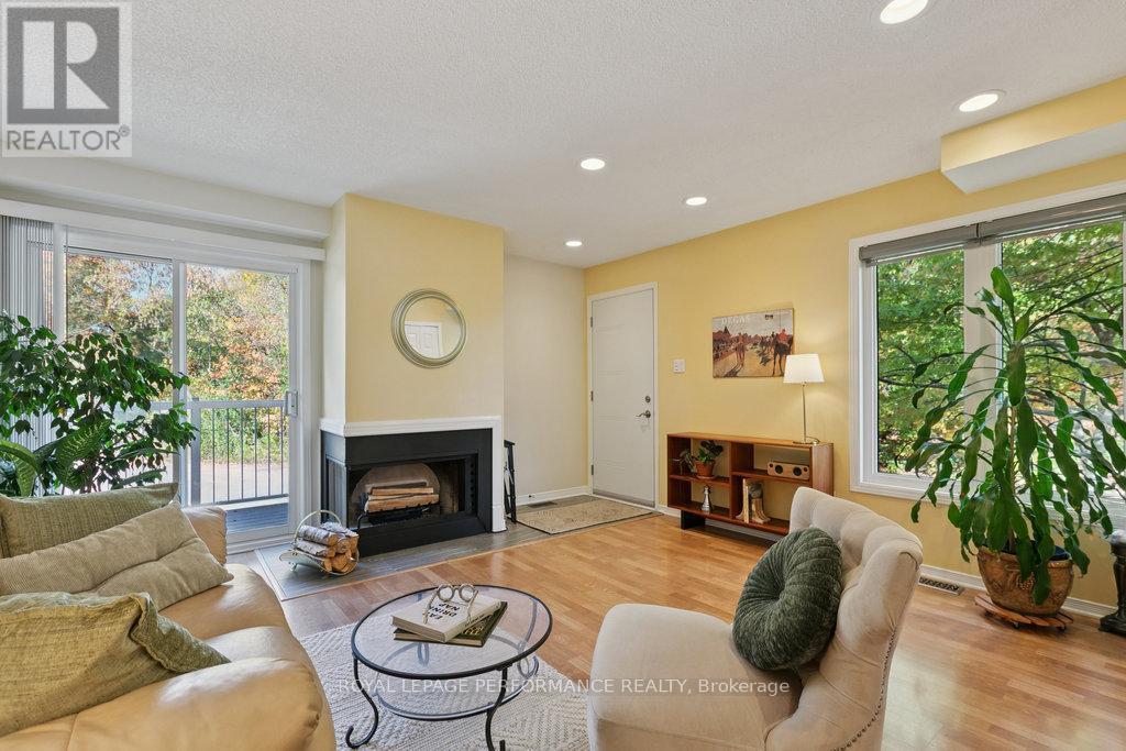 Serene Views - 560 Thomson Street, Ottawa, ON - Indoor Photo Showing Living Room With Fireplace
