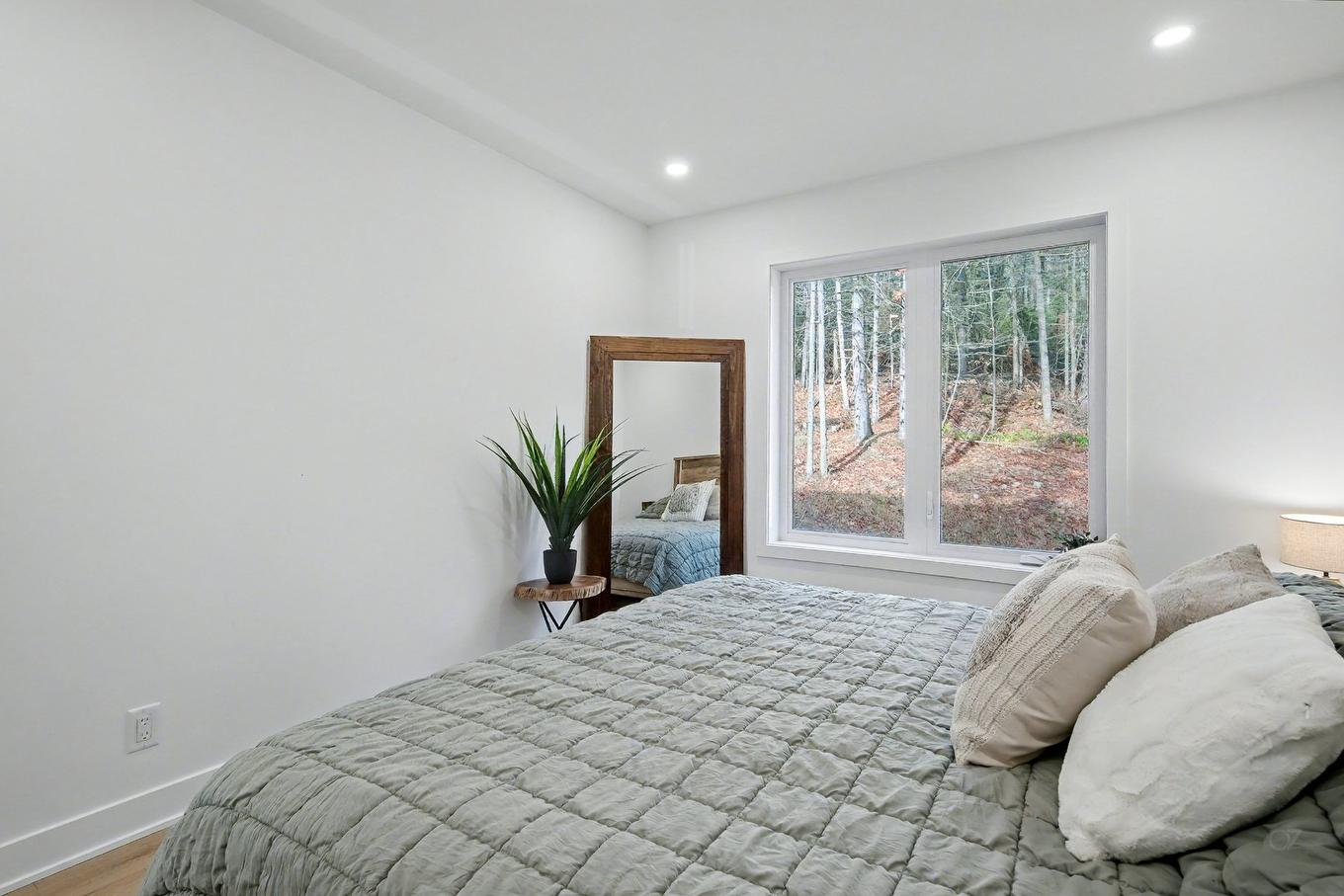 Primary bedroom - 2100 Rue Wilfrid, Val-David, QC - Indoor Photo Showing Bedroom