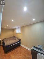 long bedroom with big windows, mirror door closet -