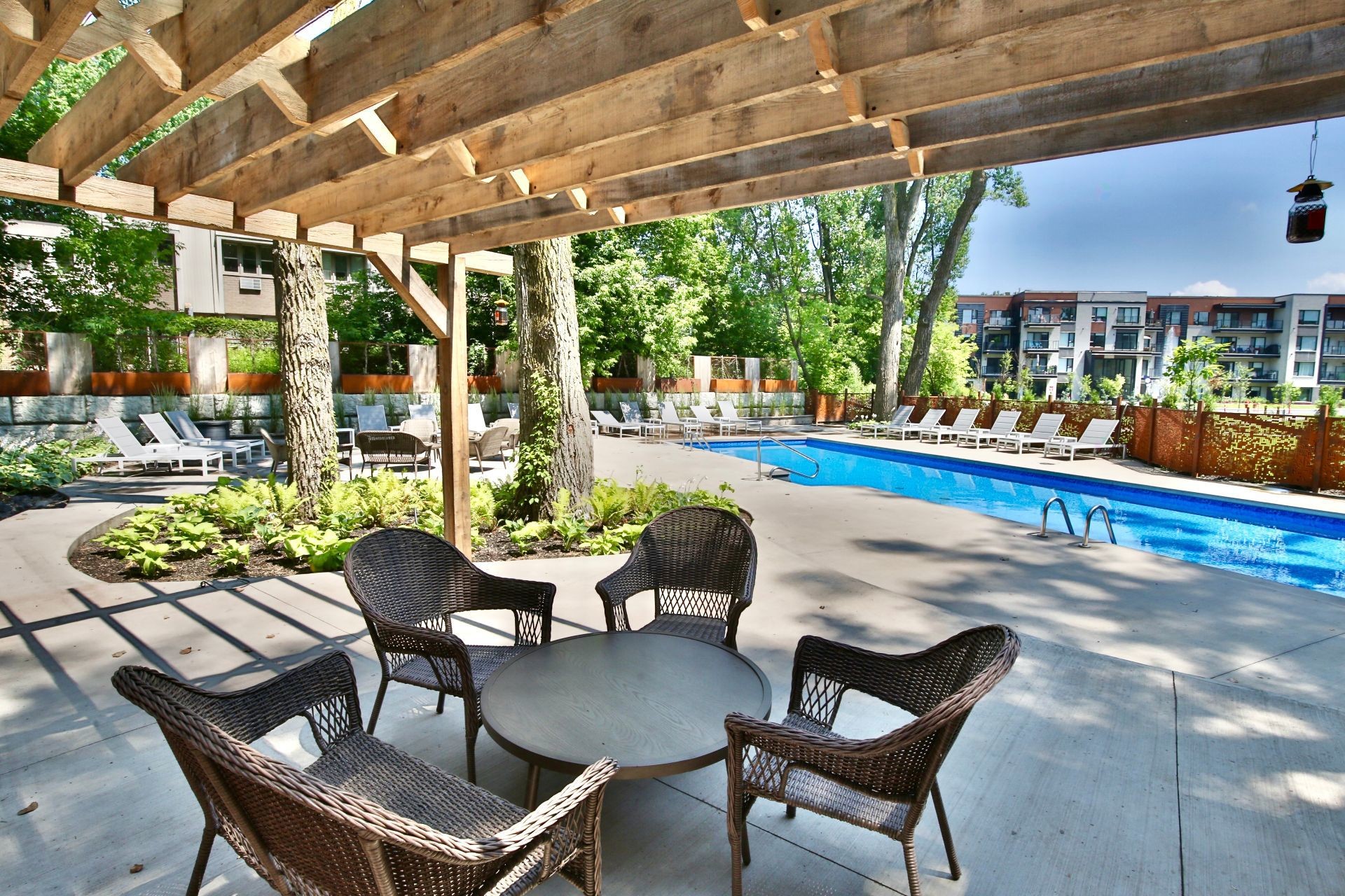 Pool - 112-2100 Rue Benoit, Saint-Bruno-De-Montarville, QC - Outdoor With In Ground Pool With Deck Patio Veranda