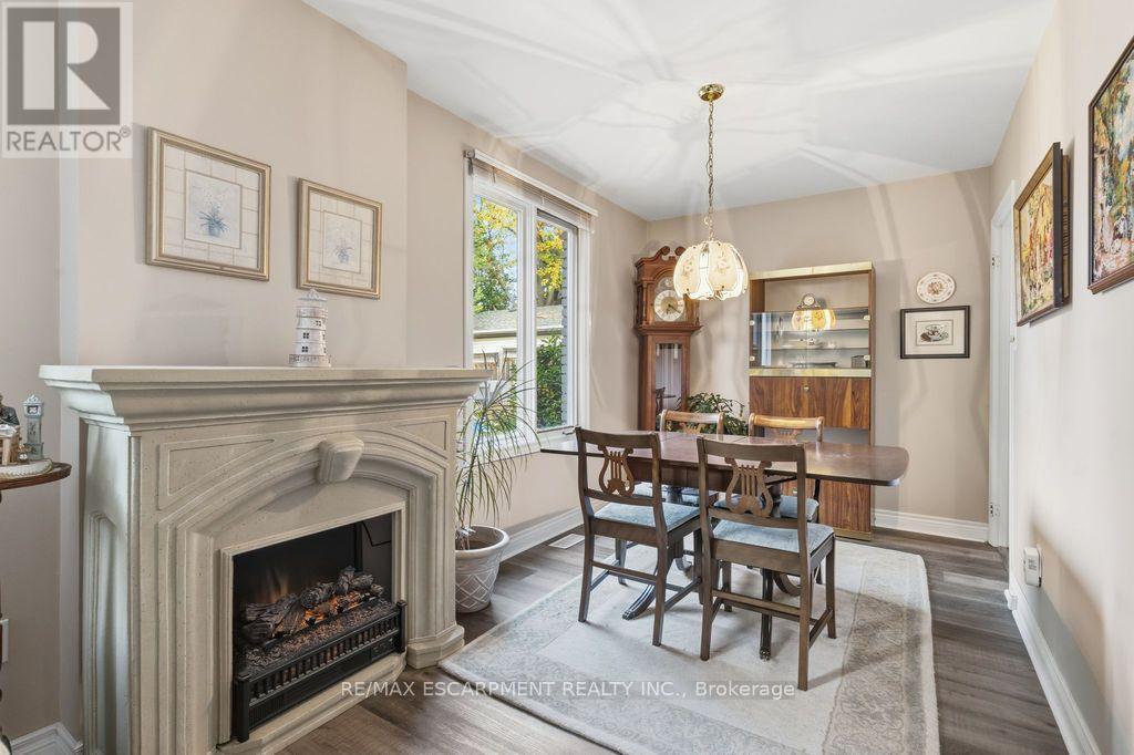 5119 Cherryhill Crescent, Burlington, ON - Indoor Photo Showing Dining Room With Fireplace