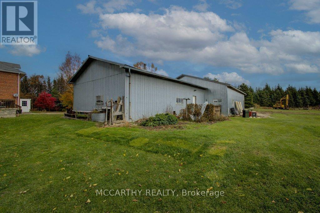 Back view of good construction Drive Shed workshop - 713630 Durham Road B, Grey Highlands, ON