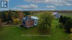drone shot of house and barn -