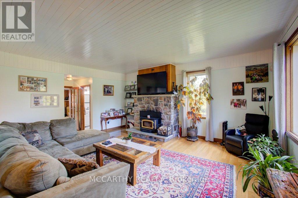 pretty Stone fire place with wood burninginsert - 713630 Durham Road B, Grey Highlands, ON