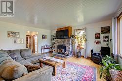 pretty Stone fire place with wood burninginsert -