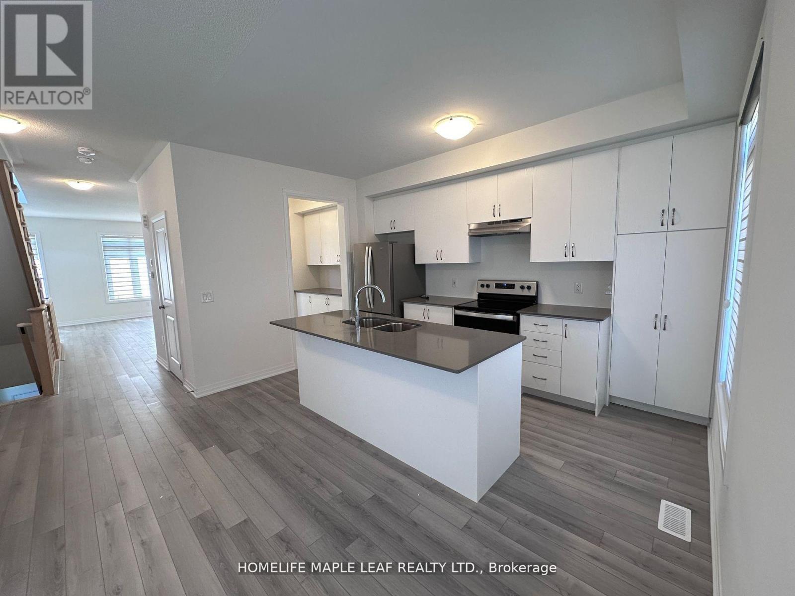 201 - 585 Colborne Street E, Brantford, ON - Indoor Photo Showing Kitchen With Double Sink