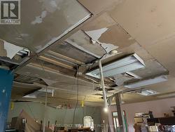Water damage to the ceiling of the workshop area -