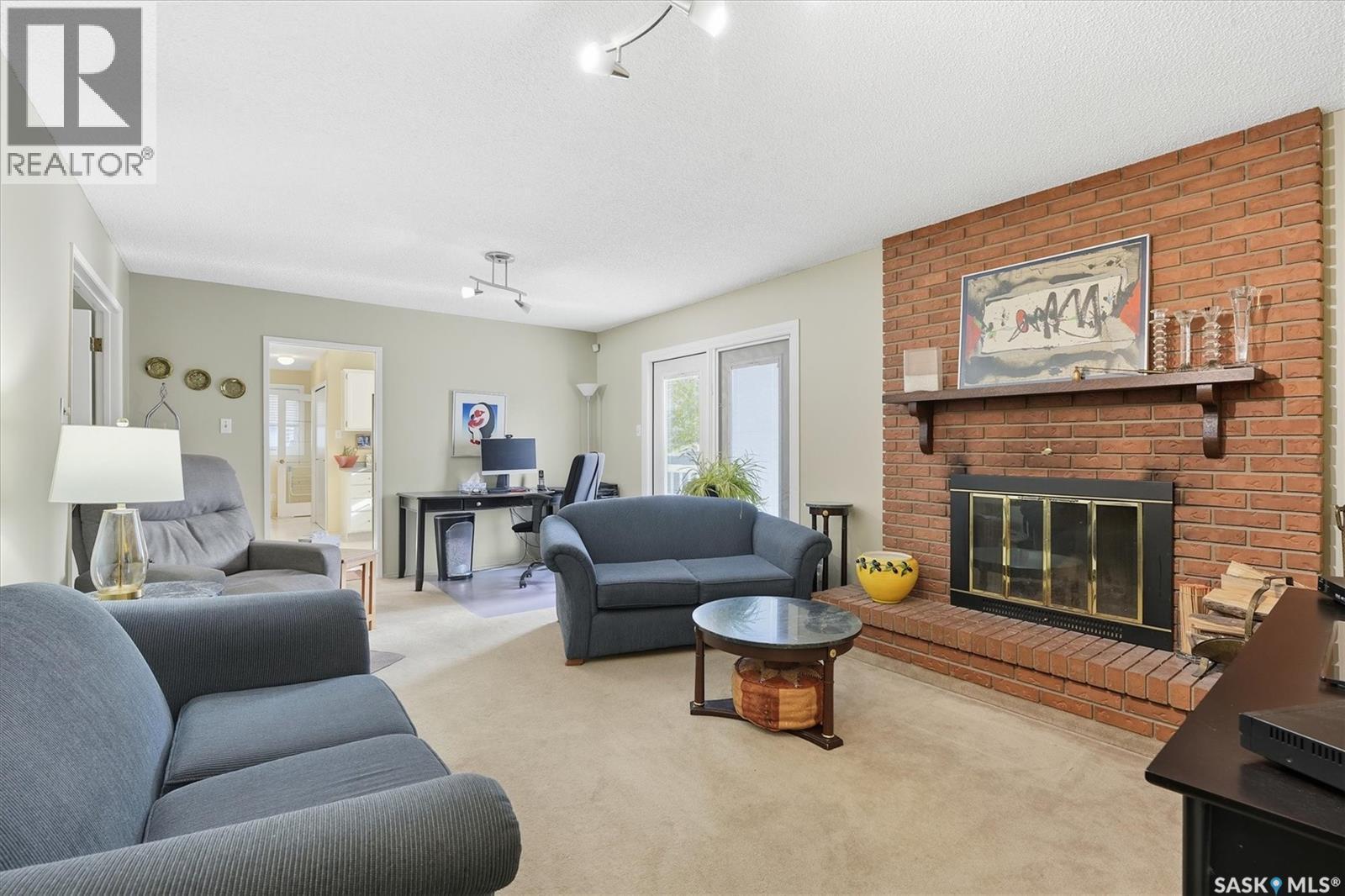 619 Trent Crescent, Saskatoon, SK - Indoor Photo Showing Living Room With Fireplace