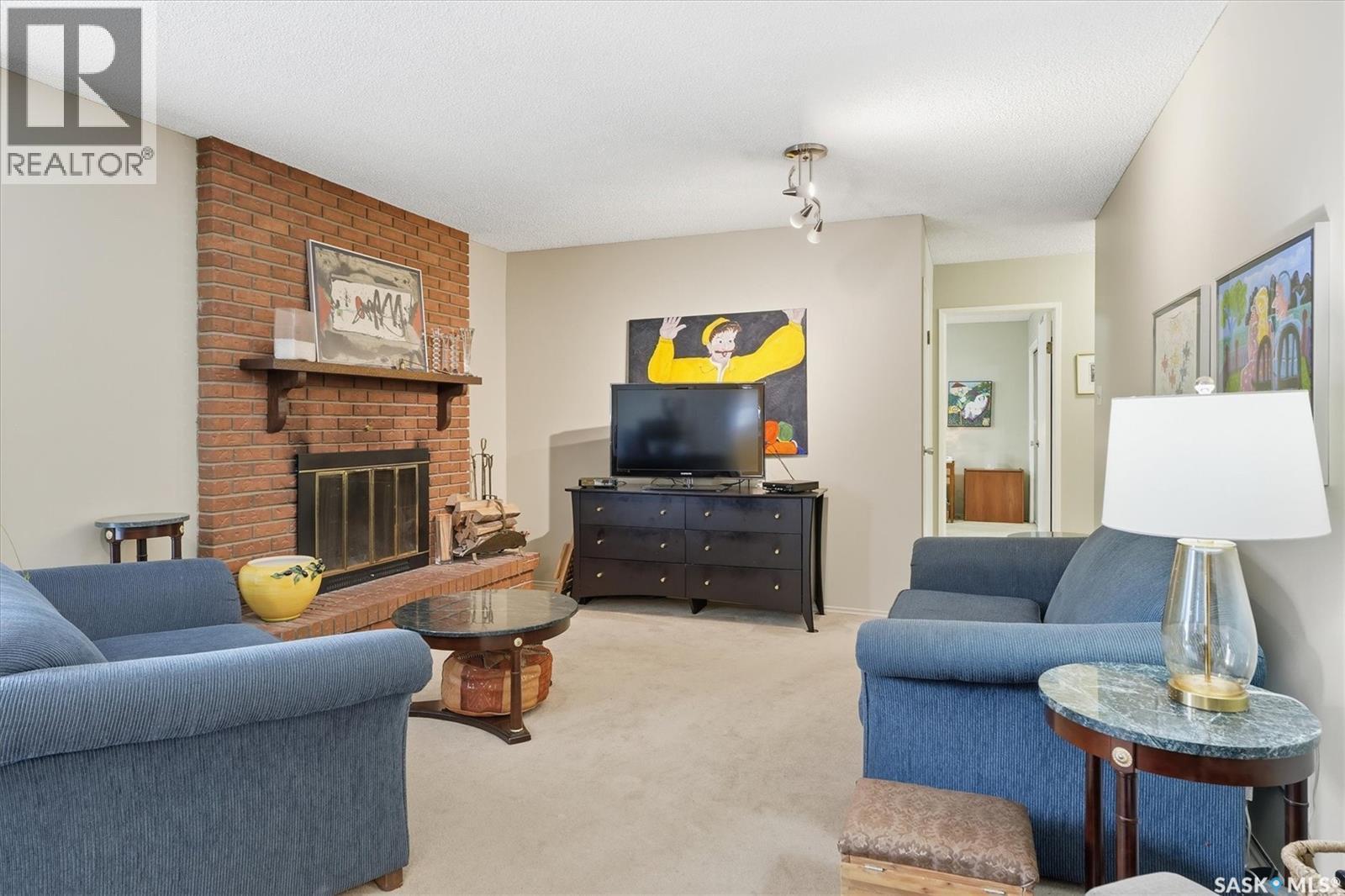619 Trent Crescent, Saskatoon, SK - Indoor Photo Showing Living Room With Fireplace