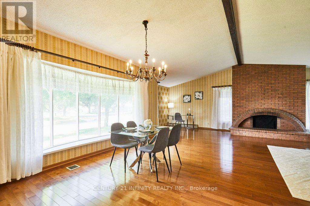 1 Goodland Gate, Toronto (Agincourt South-Malvern West), ON - Indoor Photo Showing Dining Room With Fireplace
