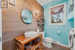 Main Floor Half Bath with Laundry -