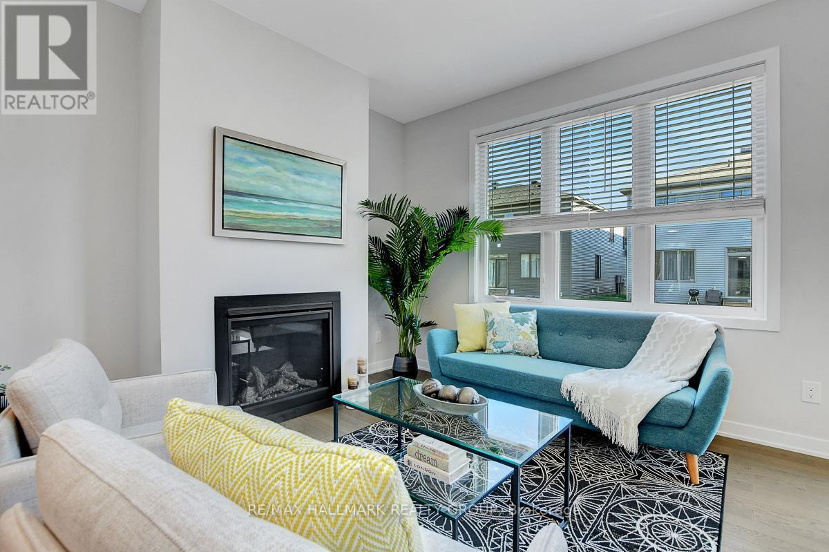 610 Fenwick Way, Ottawa, ON - Indoor Photo Showing Living Room With Fireplace