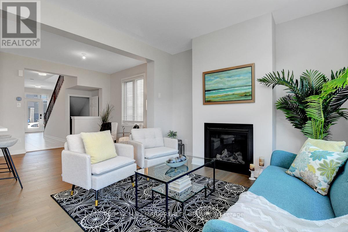 610 Fenwick Way, Ottawa, ON - Indoor Photo Showing Living Room With Fireplace