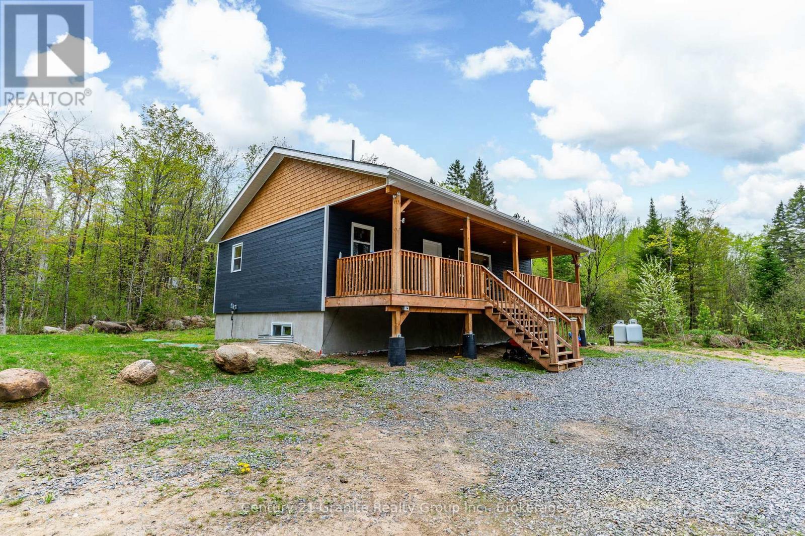 10498 Highway 118, Algonquin Highlands (Stanhope), ON - Outdoor With Deck Patio Veranda
