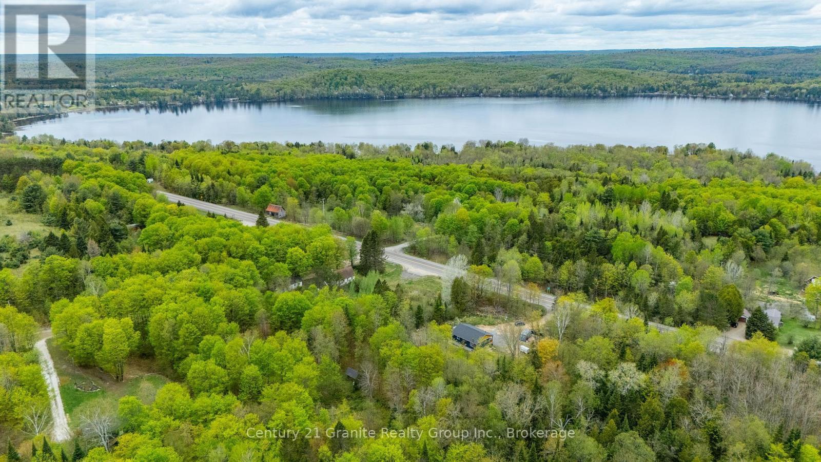 10498 Highway 118, Algonquin Highlands (Stanhope), ON - Outdoor With Body Of Water With View