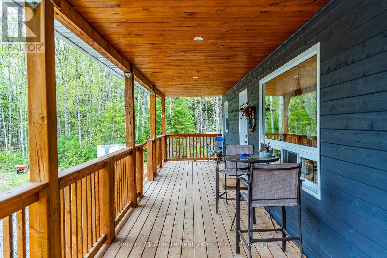 10498 Highway 118, Algonquin Highlands (Stanhope), ON - Outdoor With Deck Patio Veranda With Exterior