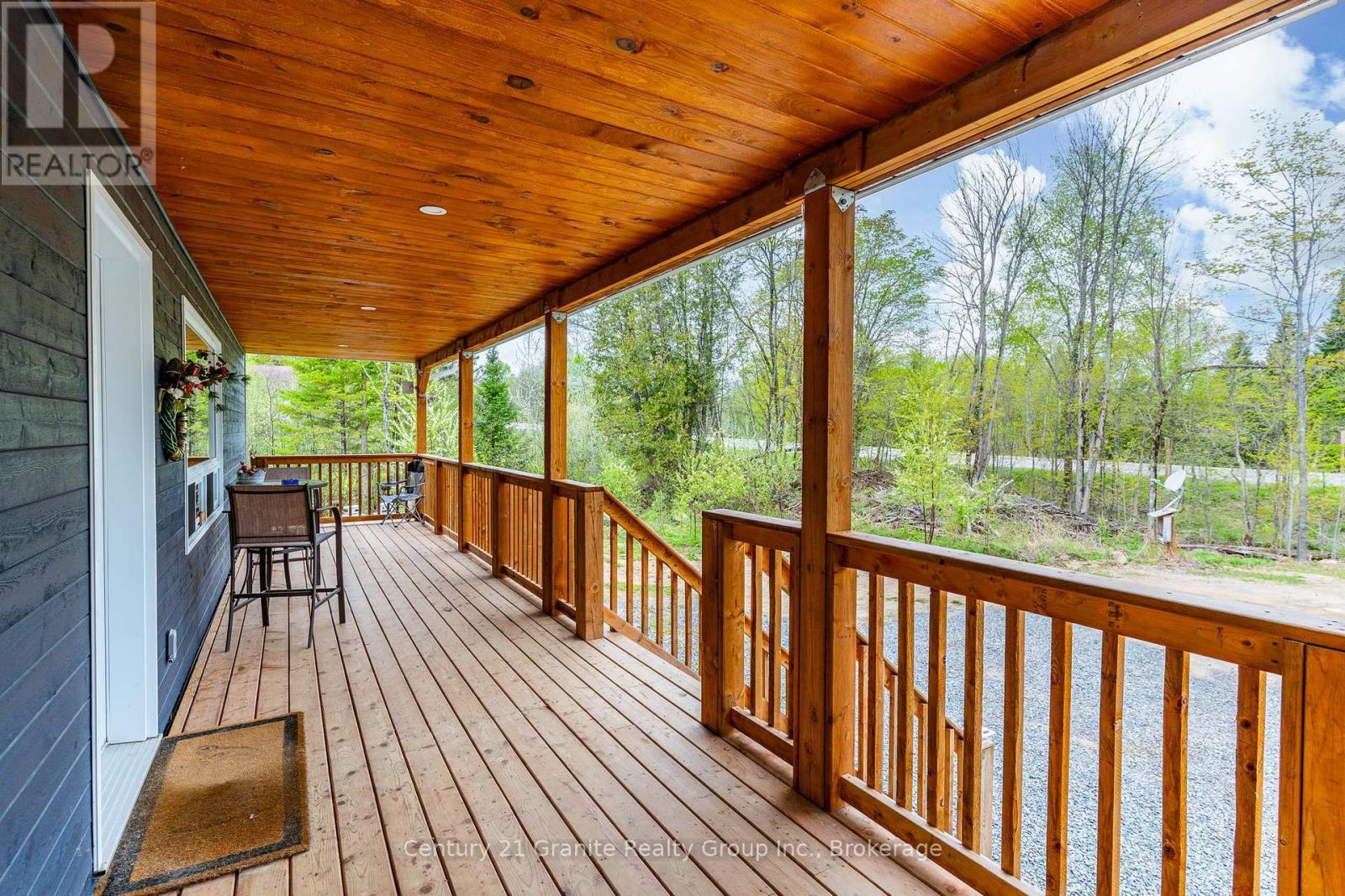 10498 Highway 118, Algonquin Highlands (Stanhope), ON - Outdoor With Deck Patio Veranda With Exterior