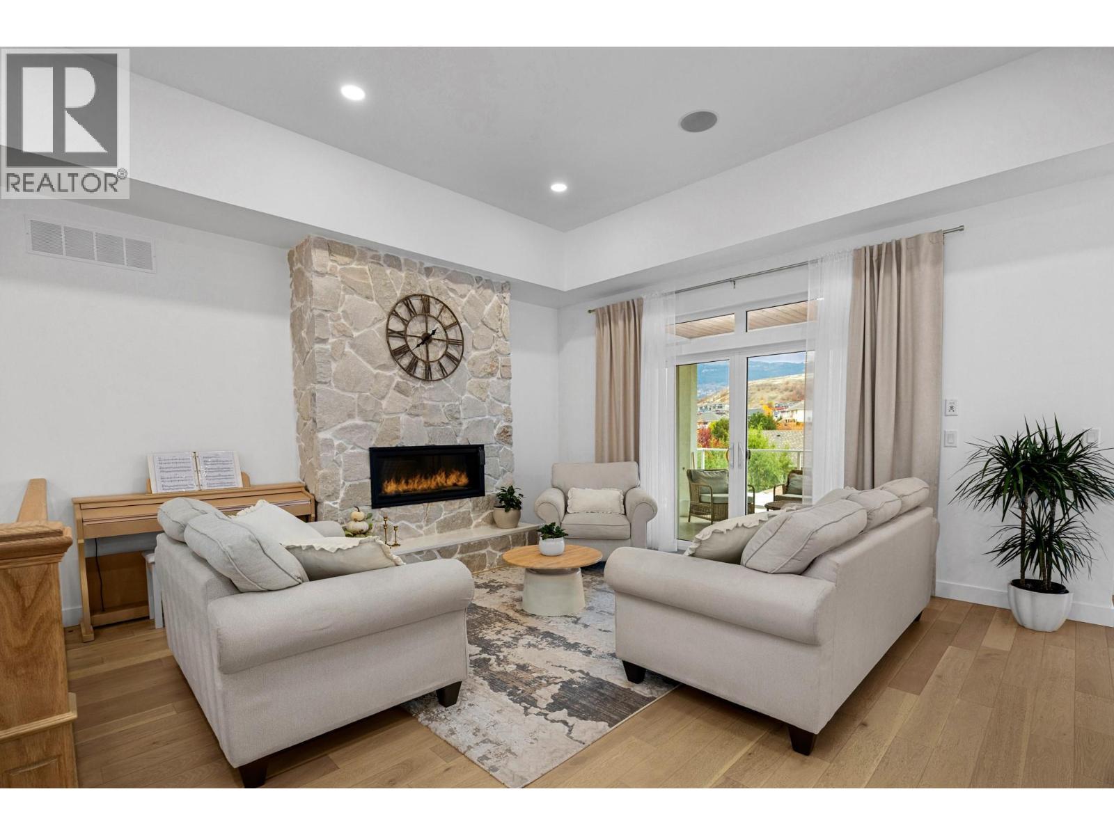 921 Mt Griffin Road Lot# 031-034-98, Vernon, BC - Indoor Photo Showing Living Room With Fireplace