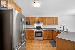 Stainless steel appliances and hardwood -